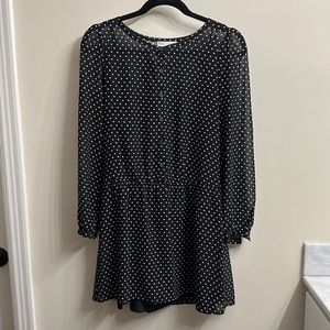 Black and white polka dot sheer dress, with interior lining. Size XS.